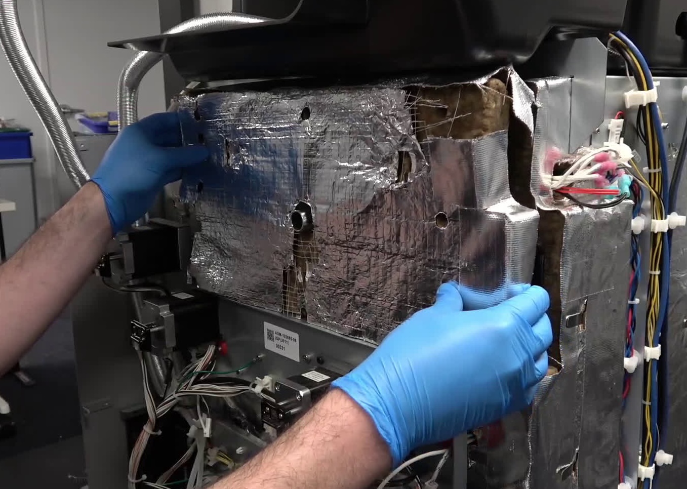 Remove the insulation and inner rear panels