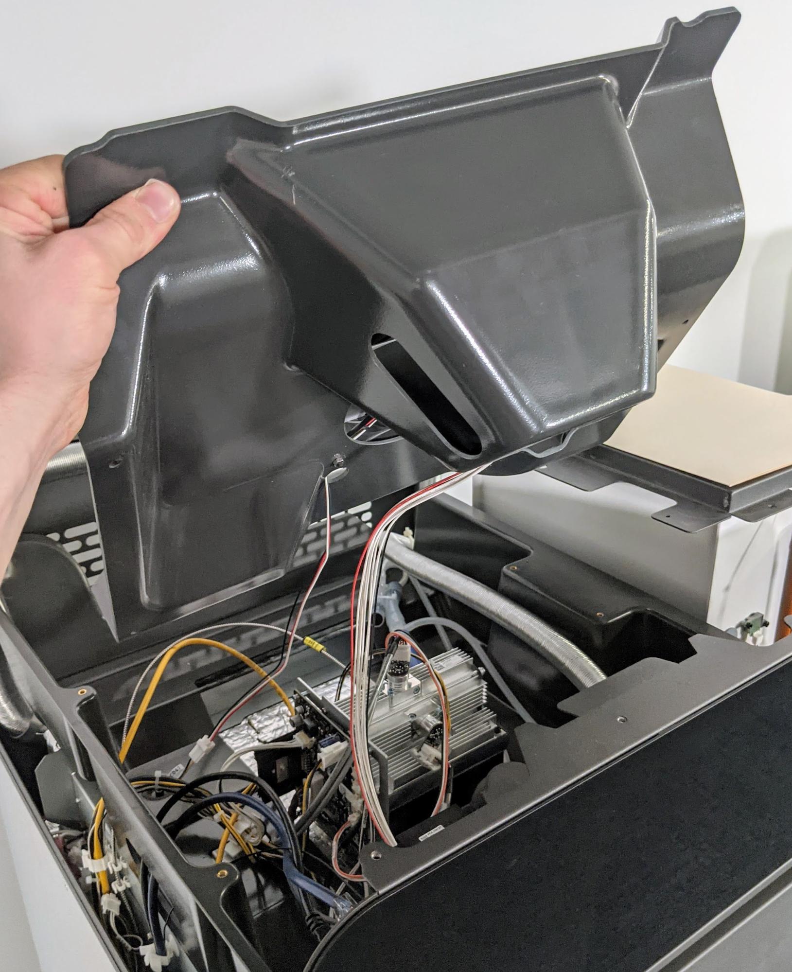 Remove the top cooling shroud