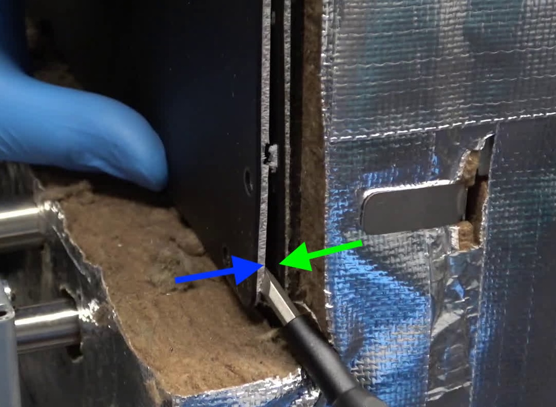 Remove the insulation and inner rear panels