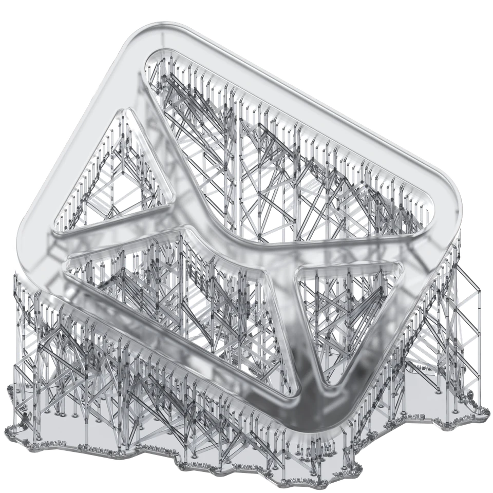 A clear resin print standing on its supports: a frosted, rounded lattice part over a dense forest of fine support structures