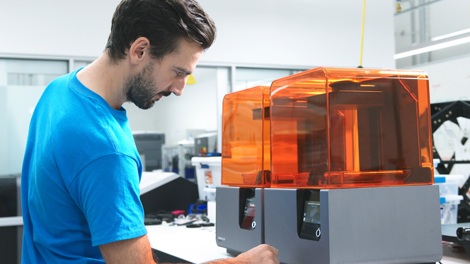 Design technologist Bryan Allen of Google ATAP interacts with a Form 2.